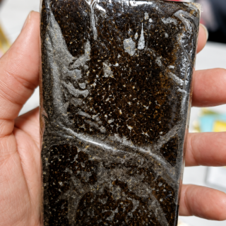 Bubble Hash showing concentrated cannabis trichomes with a natural hash texture and color