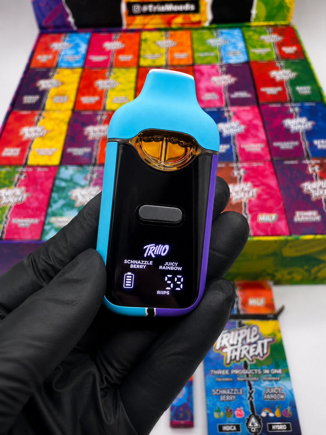 Triple Threat by Triio 100-pack wholesale display box featuring 3 in 1 bundles with preroll, disposable vape and gummies.